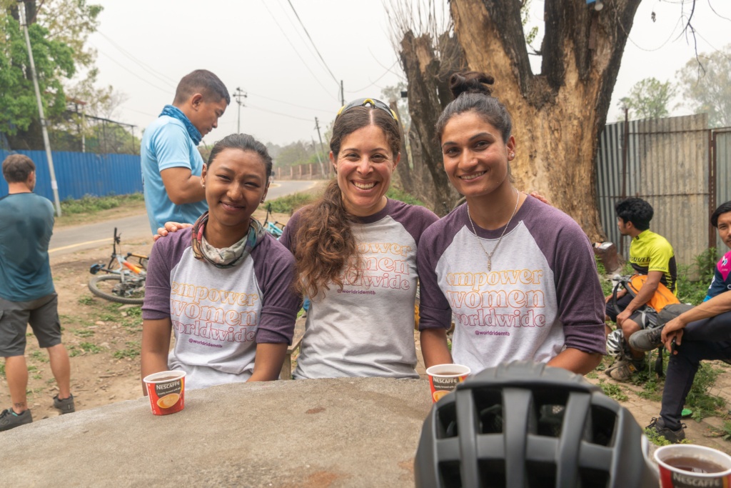 Julie, Nishma, and Usha in Nepal wearing World Ride T-Shirts