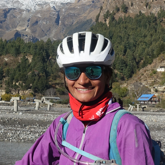 Headshot of Usha, Nepal mountain biking guide