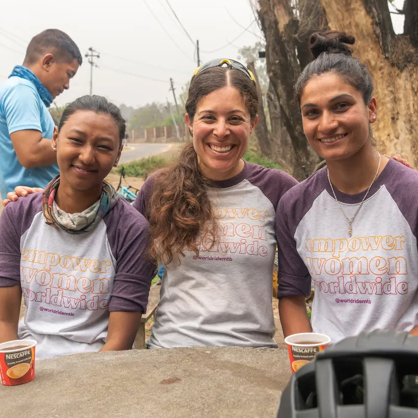 Julie, Nishma, and Usha in Nepal wearing World Ride T-Shirts