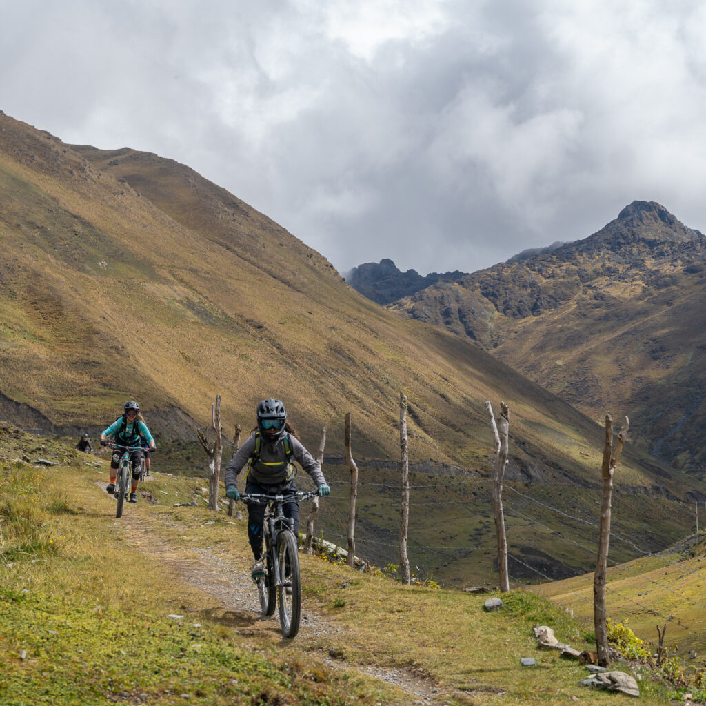 Two mountain bikers in Peru riding towards the camera